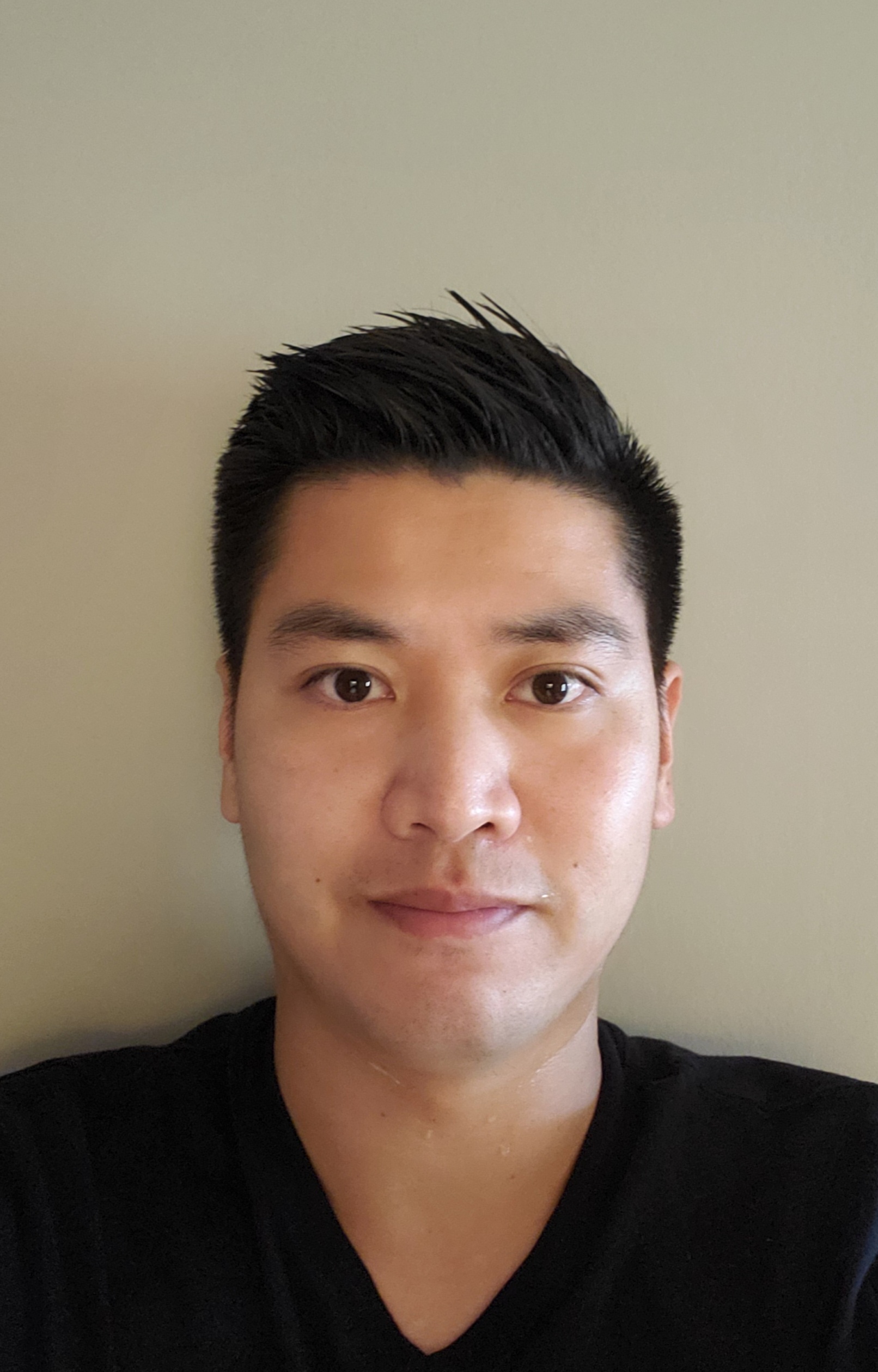 Headshot of Jeffrey Liu, acupunturist.